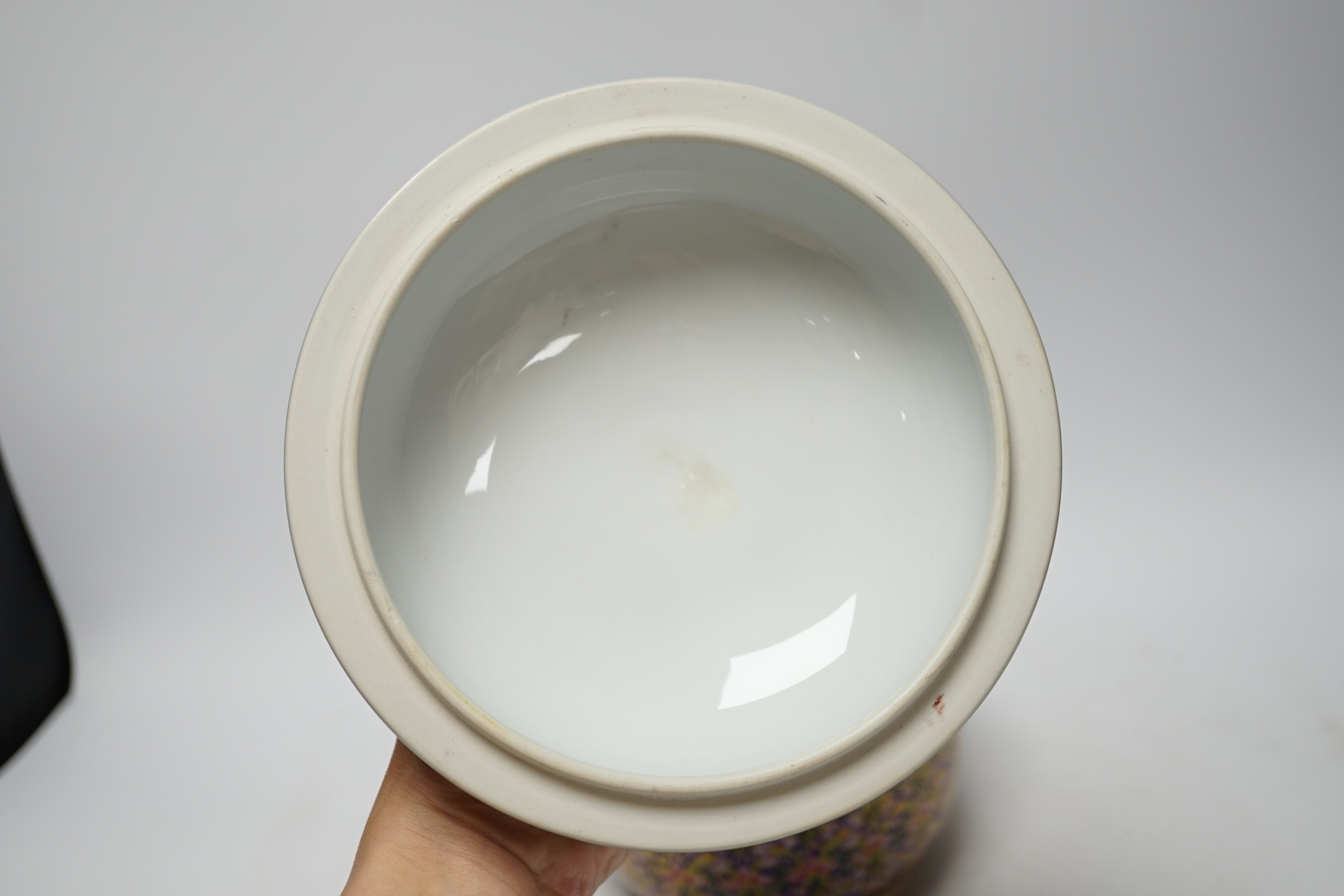 A Continental porcelain bowl and cover enamelled with flowers, 21cm high